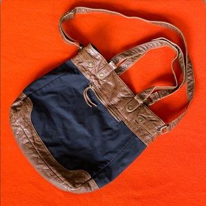 Multi-strap black and faux leather bag